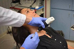 Doctor checking patient for Biopsy