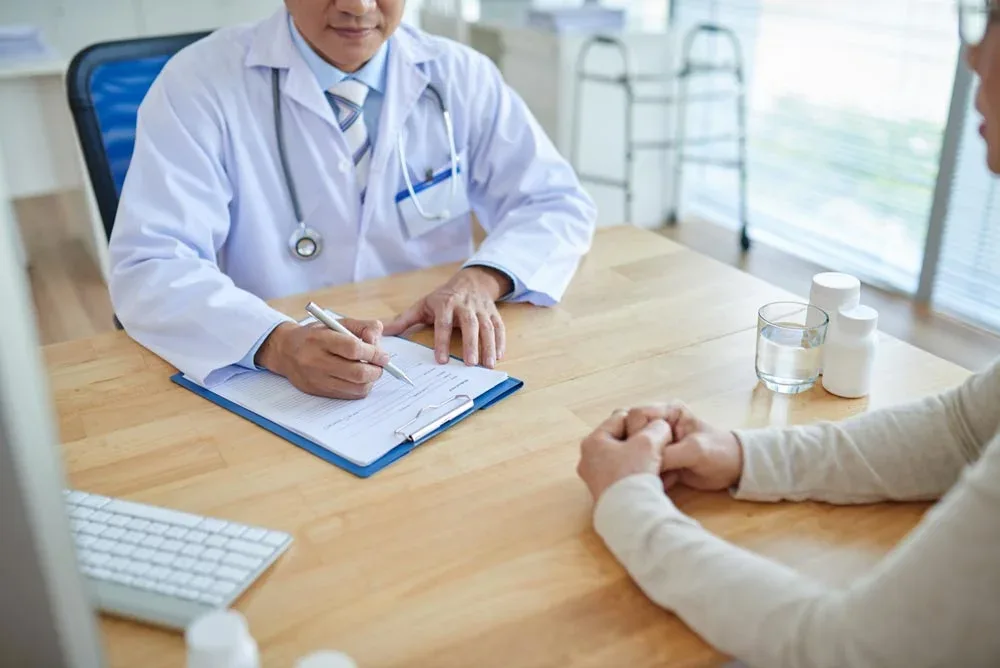 Doctor discussing treatment with a patient